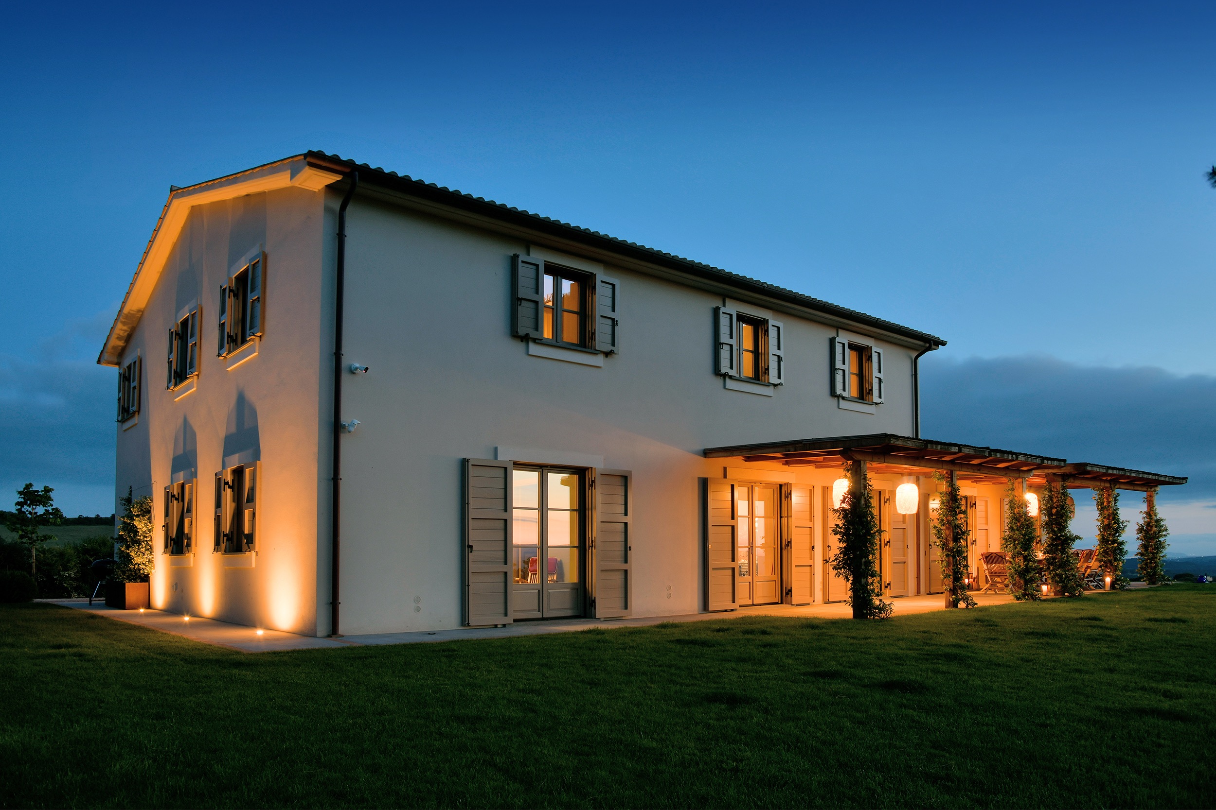 Tenuta Thun house lit at night evening